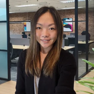 Agatha Lee headshot in a Salt office