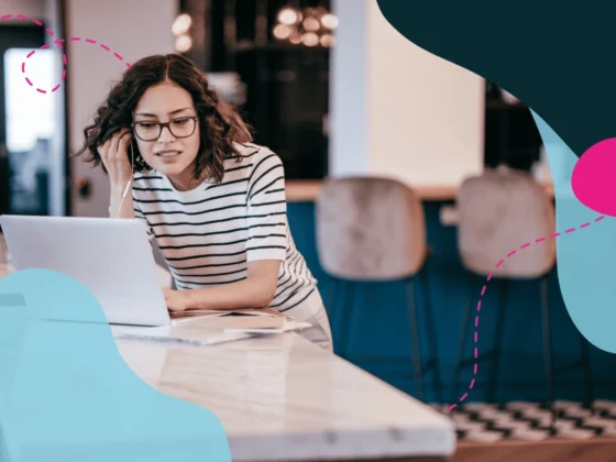 Woman on a call on her laptop in a office