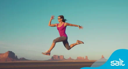 Woman running in a rough terrain