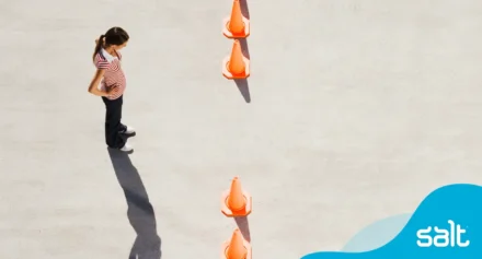Person looking at a line of cones with a gap