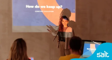 A marketing professional presenting to a room of people
