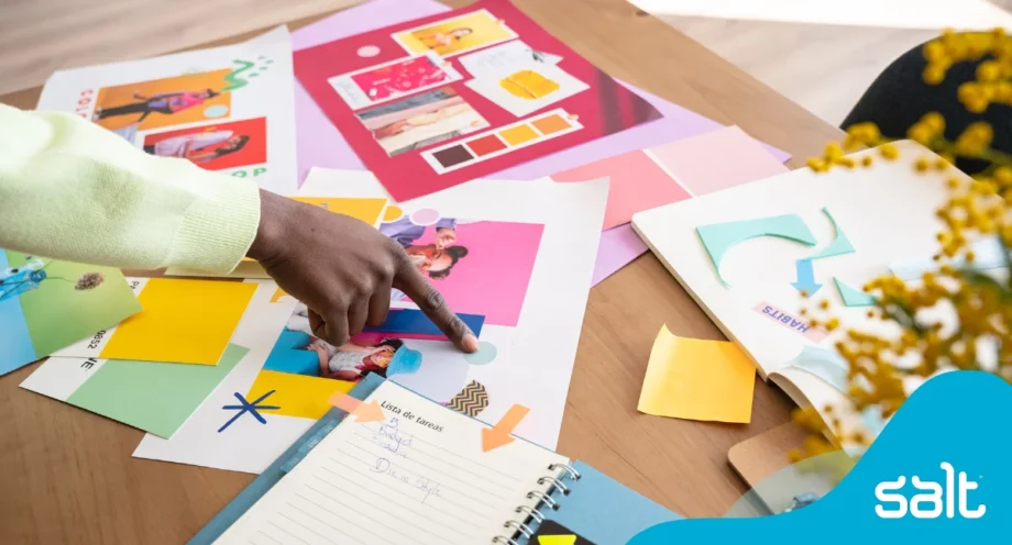 Someone creating a creative mood board for brand planning