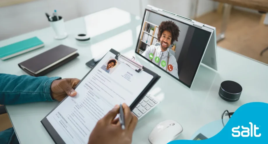 Virtual interview in progress, man on a tablet being digitally interviewed