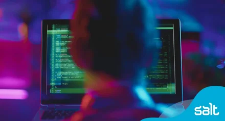 Cybersecurity professional looking at computer screen
