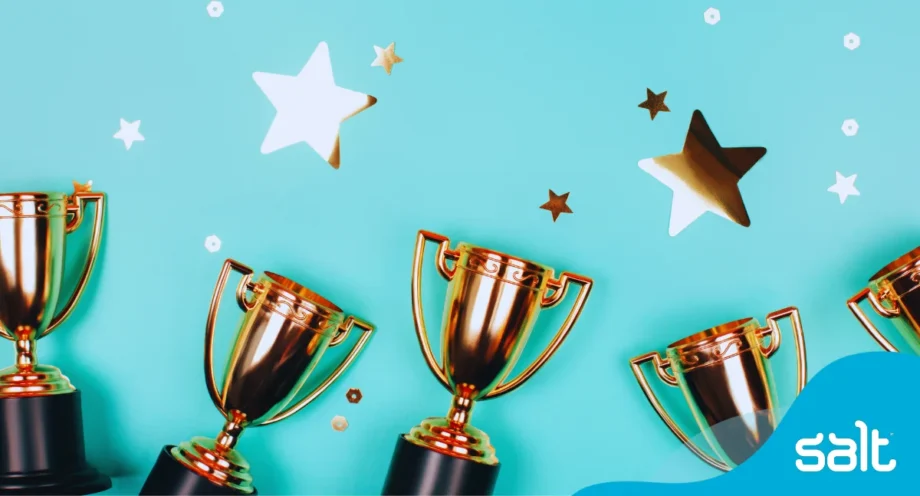 Trophies and shiny stars in celebration of award win