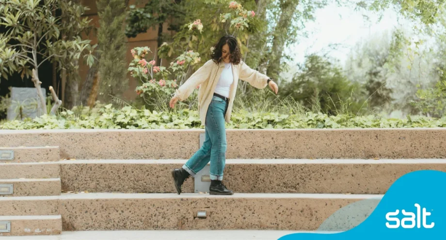 Woman dancing on stairs
