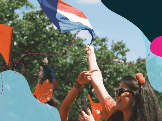 People waving The Netherlands flag