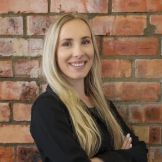 Bianca Roos headshot in a Salt office