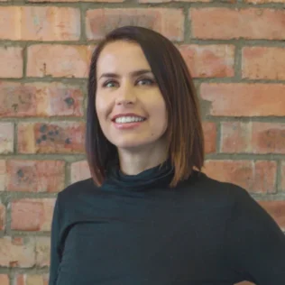 Danica Grobbelaar headshot in a Salt office