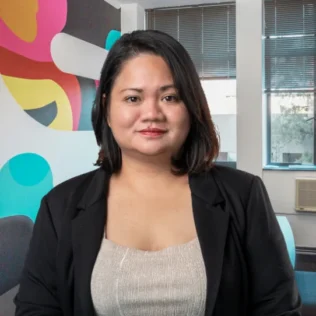 Michelle Dizon headshot in a Salt office
