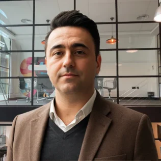 Paul Schiavo headshot in a Salt office