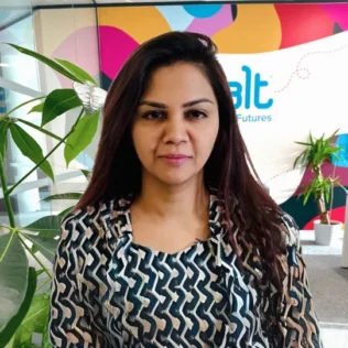 Neha Agarwal headshot in a Salt office