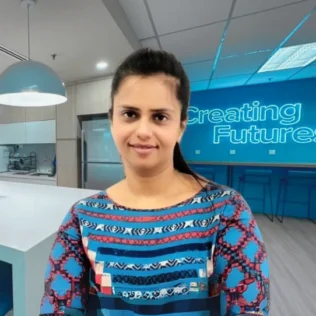 Veena Ramnath headshot in a Salt office