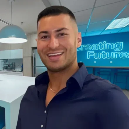 Andrew Saltos headshot in a Salt office