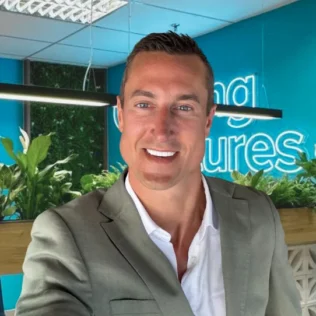 Pierce Hanson headshot in a Salt office